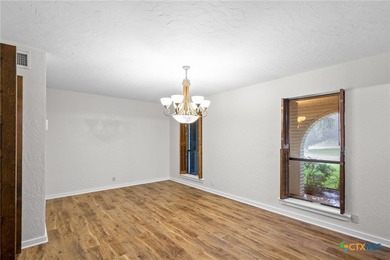 Welcome to this beautifully maintained Spanish-style two-story on Victoria Country Club in Texas - for sale on GolfHomes.com, golf home, golf lot