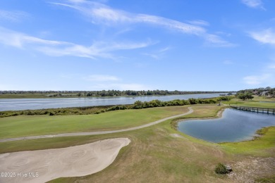 This top-floor residence has been lovingly maintained and on Brick Landing Plantation Yacht and Golf Club in North Carolina - for sale on GolfHomes.com, golf home, golf lot