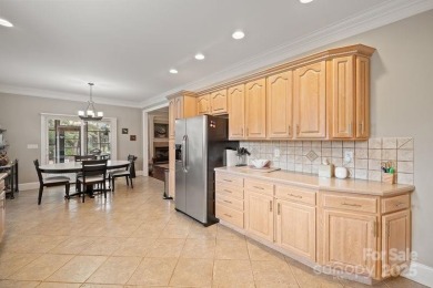 Rare find: single-level living in the Peninsula! Custom brick on The Peninsula Club in North Carolina - for sale on GolfHomes.com, golf home, golf lot