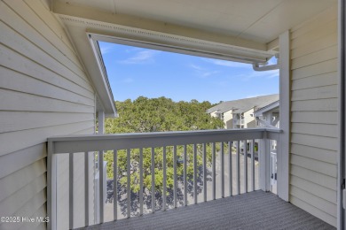 This top-floor residence has been lovingly maintained and on Brick Landing Plantation Yacht and Golf Club in North Carolina - for sale on GolfHomes.com, golf home, golf lot