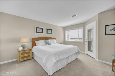 This top-floor residence has been lovingly maintained and on Brick Landing Plantation Yacht and Golf Club in North Carolina - for sale on GolfHomes.com, golf home, golf lot