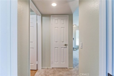 Experience refined living in this exquisite top-floor end unit on El Dorado Park Golf Course in California - for sale on GolfHomes.com, golf home, golf lot