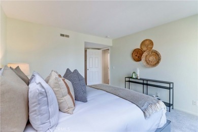 Experience refined living in this exquisite top-floor end unit on El Dorado Park Golf Course in California - for sale on GolfHomes.com, golf home, golf lot