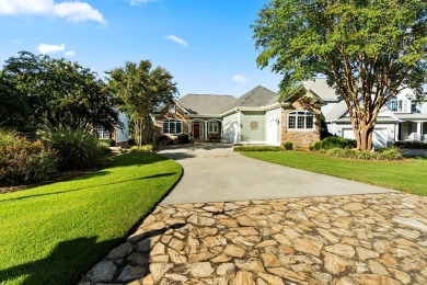 Lakefront luxury waits for you inside the exclusive Grand Harbor on The Patriot Golf Club At Grand Harbor in South Carolina - for sale on GolfHomes.com, golf home, golf lot