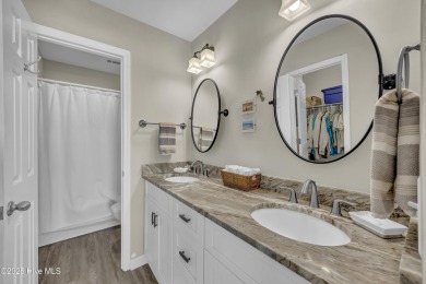 This top-floor residence has been lovingly maintained and on Brick Landing Plantation Yacht and Golf Club in North Carolina - for sale on GolfHomes.com, golf home, golf lot