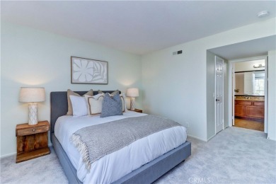 Experience refined living in this exquisite top-floor end unit on El Dorado Park Golf Course in California - for sale on GolfHomes.com, golf home, golf lot