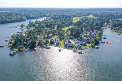 Lakefront luxury waits for you inside the exclusive Grand Harbor on The Patriot Golf Club At Grand Harbor in South Carolina - for sale on GolfHomes.com, golf home, golf lot