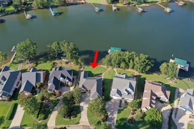 Lakefront luxury waits for you inside the exclusive Grand Harbor on The Patriot Golf Club At Grand Harbor in South Carolina - for sale on GolfHomes.com, golf home, golf lot