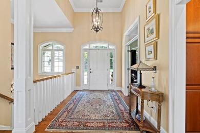 Lakefront luxury waits for you inside the exclusive Grand Harbor on The Patriot Golf Club At Grand Harbor in South Carolina - for sale on GolfHomes.com, golf home, golf lot