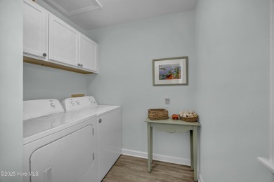 This top-floor residence has been lovingly maintained and on Brick Landing Plantation Yacht and Golf Club in North Carolina - for sale on GolfHomes.com, golf home, golf lot