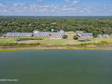 This top-floor residence has been lovingly maintained and on Brick Landing Plantation Yacht and Golf Club in North Carolina - for sale on GolfHomes.com, golf home, golf lot