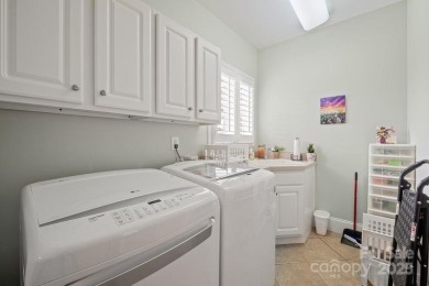 Rare find: single-level living in the Peninsula! Custom brick on The Peninsula Club in North Carolina - for sale on GolfHomes.com, golf home, golf lot