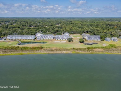 This top-floor residence has been lovingly maintained and on Brick Landing Plantation Yacht and Golf Club in North Carolina - for sale on GolfHomes.com, golf home, golf lot