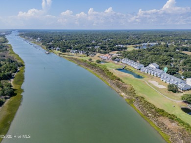 This top-floor residence has been lovingly maintained and on Brick Landing Plantation Yacht and Golf Club in North Carolina - for sale on GolfHomes.com, golf home, golf lot