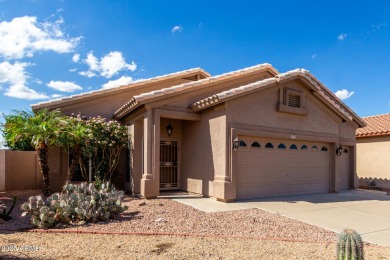 Nestled in the serene cul-de-sac of the prestigious Coyote Lakes on Coyote Lakes Golf Club in Arizona - for sale on GolfHomes.com, golf home, golf lot