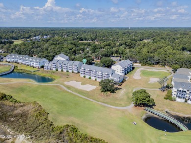 This top-floor residence has been lovingly maintained and on Brick Landing Plantation Yacht and Golf Club in North Carolina - for sale on GolfHomes.com, golf home, golf lot