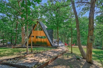 This one of a kind Scandanavian inspired A-frame offers a on Tanglewood Resort in Texas - for sale on GolfHomes.com, golf home, golf lot