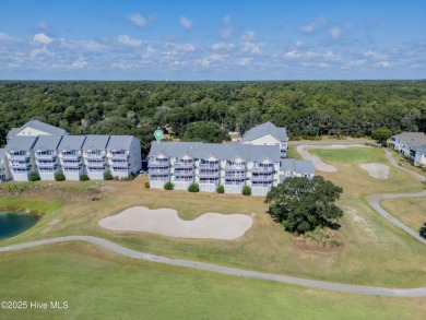 This top-floor residence has been lovingly maintained and on Brick Landing Plantation Yacht and Golf Club in North Carolina - for sale on GolfHomes.com, golf home, golf lot