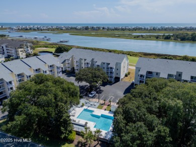 This top-floor residence has been lovingly maintained and on Brick Landing Plantation Yacht and Golf Club in North Carolina - for sale on GolfHomes.com, golf home, golf lot