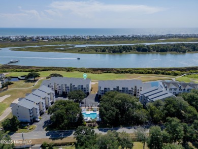 This top-floor residence has been lovingly maintained and on Brick Landing Plantation Yacht and Golf Club in North Carolina - for sale on GolfHomes.com, golf home, golf lot