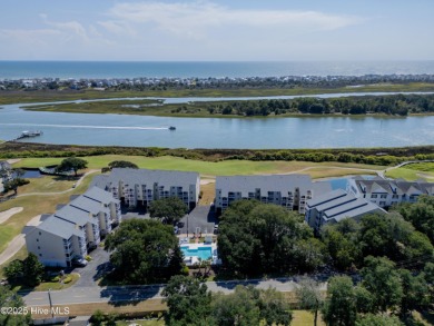 This top-floor residence has been lovingly maintained and on Brick Landing Plantation Yacht and Golf Club in North Carolina - for sale on GolfHomes.com, golf home, golf lot