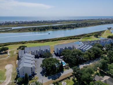 This top-floor residence has been lovingly maintained and on Brick Landing Plantation Yacht and Golf Club in North Carolina - for sale on GolfHomes.com, golf home, golf lot