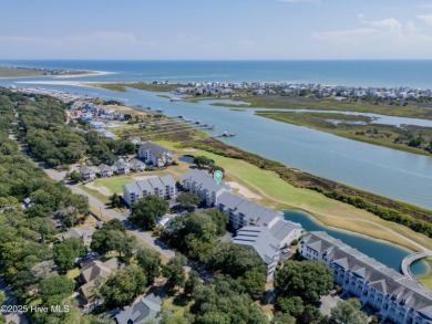 This top-floor residence has been lovingly maintained and on Brick Landing Plantation Yacht and Golf Club in North Carolina - for sale on GolfHomes.com, golf home, golf lot