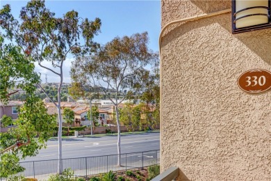 Experience refined living in this exquisite top-floor end unit on El Dorado Park Golf Course in California - for sale on GolfHomes.com, golf home, golf lot