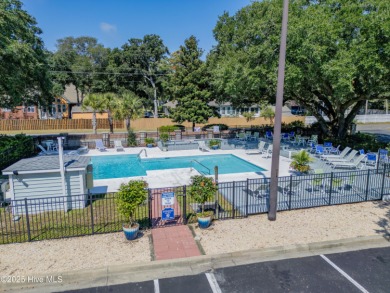 This top-floor residence has been lovingly maintained and on Brick Landing Plantation Yacht and Golf Club in North Carolina - for sale on GolfHomes.com, golf home, golf lot