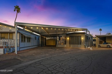 ON LEASED LAND***  This beautifully updated TURN-KEY home is on London Bridge Golf Course in Arizona - for sale on GolfHomes.com, golf home, golf lot