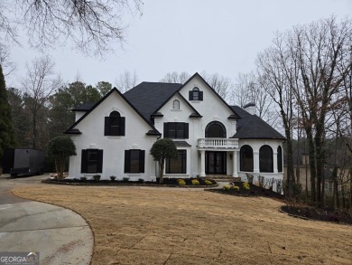 Experience luxurious golf course living in this meticulously on St. Marlo Country Club in Georgia - for sale on GolfHomes.com, golf home, golf lot