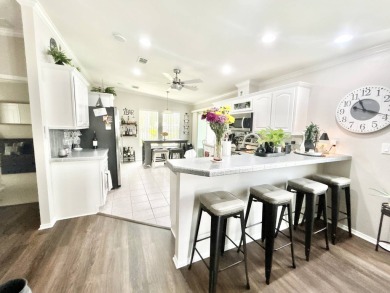 Welcome to this beautifully maintained 3-bedroom, 2-bathroom on Crane Lakes Golf and Country Club in Florida - for sale on GolfHomes.com, golf home, golf lot