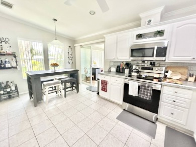 Welcome to this beautifully maintained 3-bedroom, 2-bathroom on Crane Lakes Golf and Country Club in Florida - for sale on GolfHomes.com, golf home, golf lot