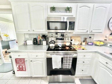 Welcome to this beautifully maintained 3-bedroom, 2-bathroom on Crane Lakes Golf and Country Club in Florida - for sale on GolfHomes.com, golf home, golf lot