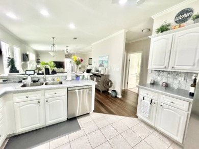 Welcome to this beautifully maintained 3-bedroom, 2-bathroom on Crane Lakes Golf and Country Club in Florida - for sale on GolfHomes.com, golf home, golf lot