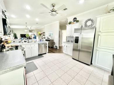 Welcome to this beautifully maintained 3-bedroom, 2-bathroom on Crane Lakes Golf and Country Club in Florida - for sale on GolfHomes.com, golf home, golf lot