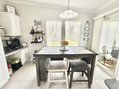 Welcome to this beautifully maintained 3-bedroom, 2-bathroom on Crane Lakes Golf and Country Club in Florida - for sale on GolfHomes.com, golf home, golf lot