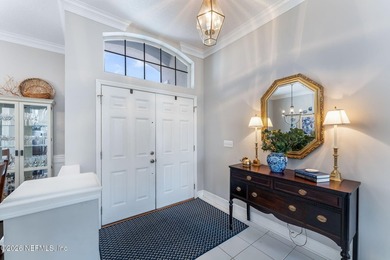 Tucked along a tranquil lagoon inside the prestigious on Jacksonville Golf and Country Club in Florida - for sale on GolfHomes.com, golf home, golf lot