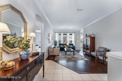 Tucked along a tranquil lagoon inside the prestigious on Jacksonville Golf and Country Club in Florida - for sale on GolfHomes.com, golf home, golf lot