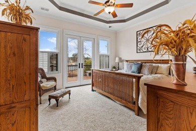 Experience the pinnacle of lakefront luxury in this stunning on The Patriot Golf Club At Grand Harbor in South Carolina - for sale on GolfHomes.com, golf home, golf lot