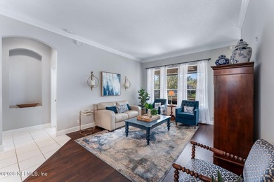 Tucked along a tranquil lagoon inside the prestigious on Jacksonville Golf and Country Club in Florida - for sale on GolfHomes.com, golf home, golf lot