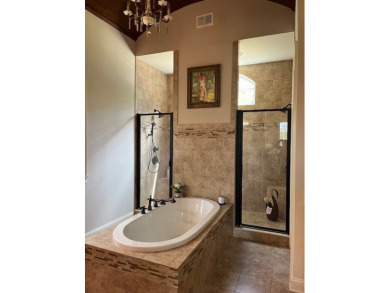 Experience the pinnacle of lakefront luxury in this stunning on The Patriot Golf Club At Grand Harbor in South Carolina - for sale on GolfHomes.com, golf home, golf lot