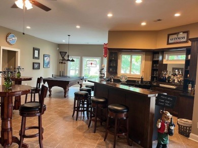 Experience the pinnacle of lakefront luxury in this stunning on The Patriot Golf Club At Grand Harbor in South Carolina - for sale on GolfHomes.com, golf home, golf lot