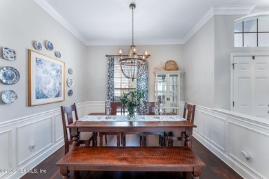 Tucked along a tranquil lagoon inside the prestigious on Jacksonville Golf and Country Club in Florida - for sale on GolfHomes.com, golf home, golf lot