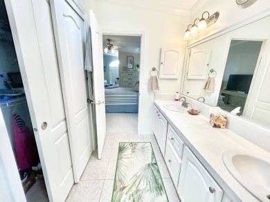 Welcome to this beautifully maintained 3-bedroom, 2-bathroom on Crane Lakes Golf and Country Club in Florida - for sale on GolfHomes.com, golf home, golf lot
