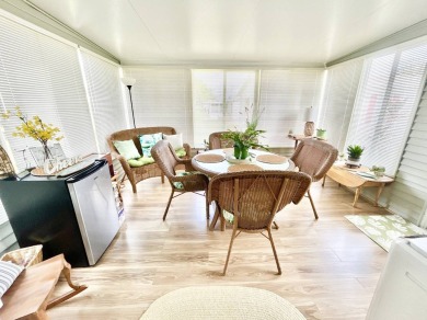 Welcome to this beautifully maintained 3-bedroom, 2-bathroom on Crane Lakes Golf and Country Club in Florida - for sale on GolfHomes.com, golf home, golf lot
