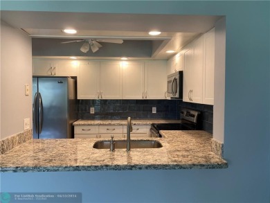 Desirable and spacious 1 bedroom and 1-1/2 bath with golf and on Flamingo Lakes Country Club in Florida - for sale on GolfHomes.com, golf home, golf lot