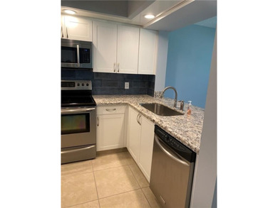 Desirable and spacious 1 bedroom and 1-1/2 bath with golf and on Flamingo Lakes Country Club in Florida - for sale on GolfHomes.com, golf home, golf lot