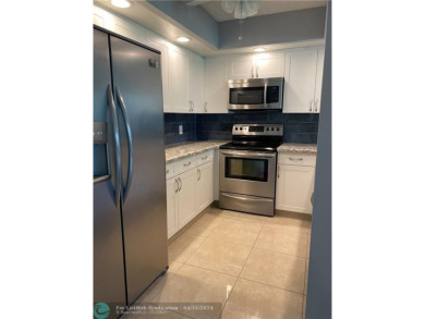 Desirable and spacious 1 bedroom and 1-1/2 bath with golf and on Flamingo Lakes Country Club in Florida - for sale on GolfHomes.com, golf home, golf lot