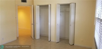 Desirable and spacious 1 bedroom and 1-1/2 bath with golf and on Flamingo Lakes Country Club in Florida - for sale on GolfHomes.com, golf home, golf lot